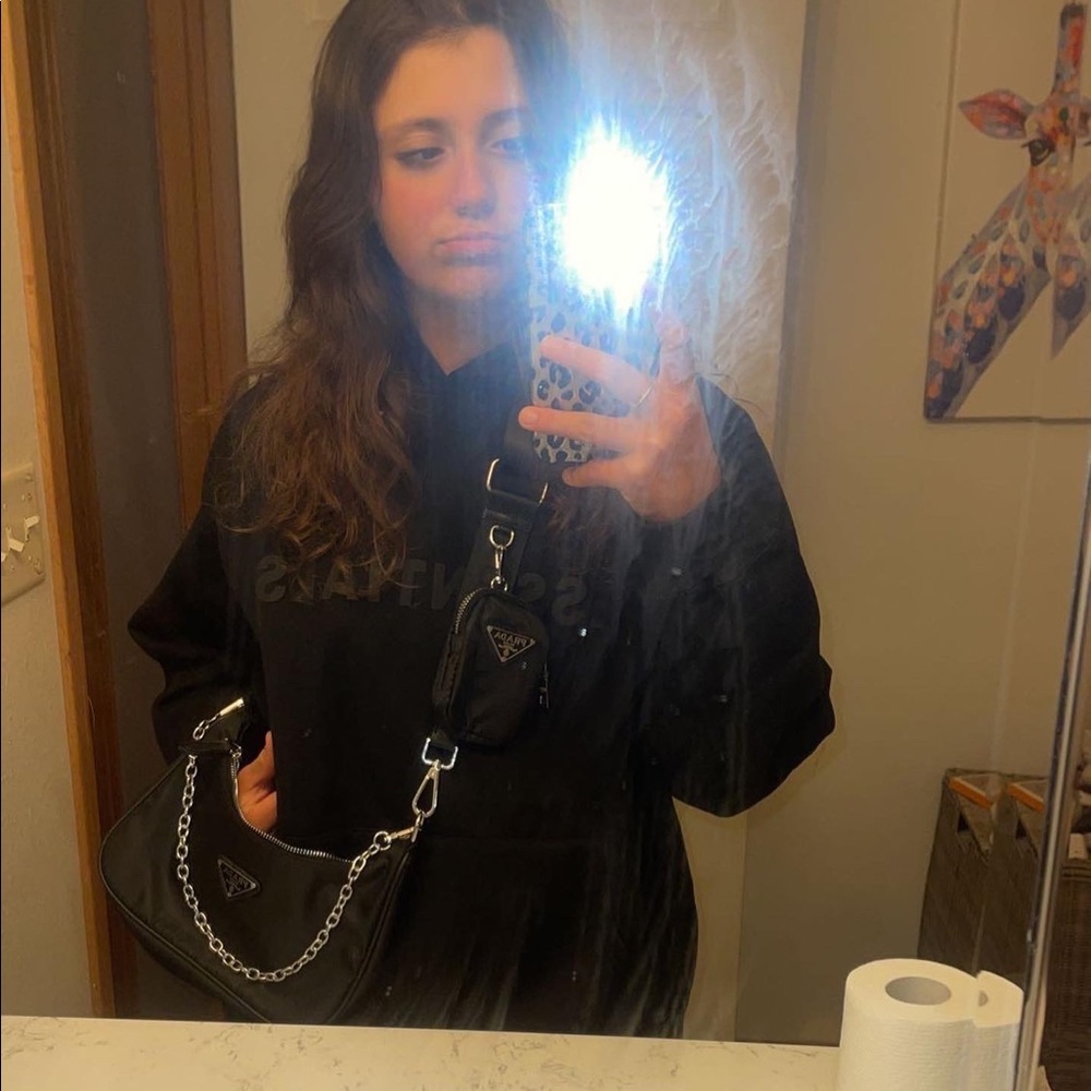 Black FOG Essentials hoodie.